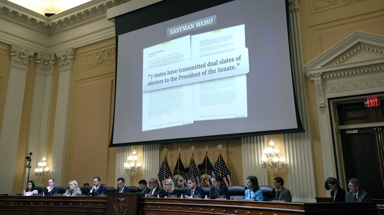 OCTC counsel sits in front of large screen showing Eastman's memo as evidence