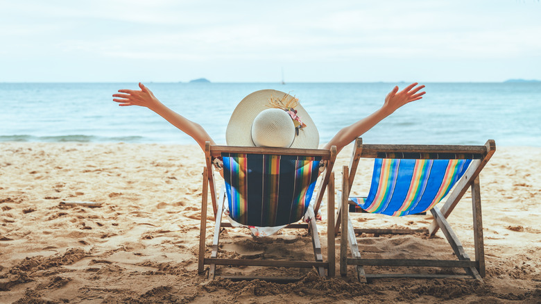 Person sitting at a beach