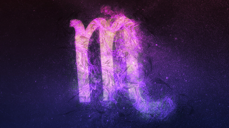 Scorpio symbol on cosmic background