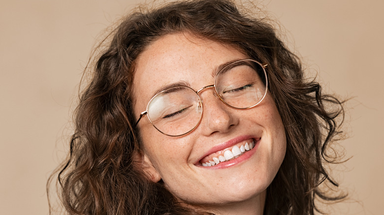 Confident woman smiling