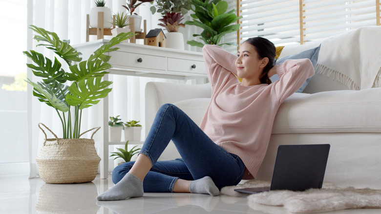 A woman relaxing on the floor 