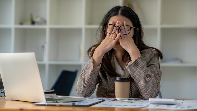 A woman looking tired