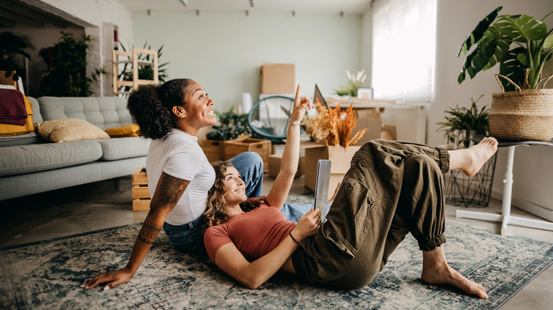 Couple relaxing on the floor