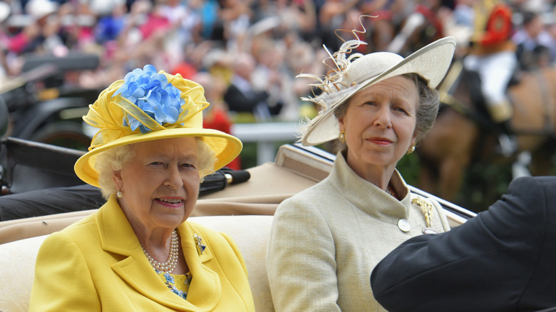 Queen Elizabeth and Princess Anne in carriage