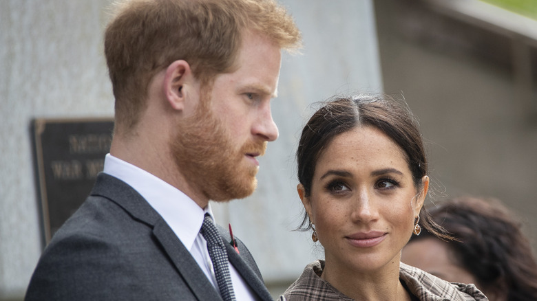 Meghan Markle looks at Prince Harry