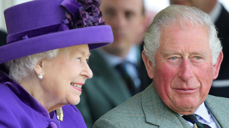 Queen Elizabeth and Prince Charles smiling