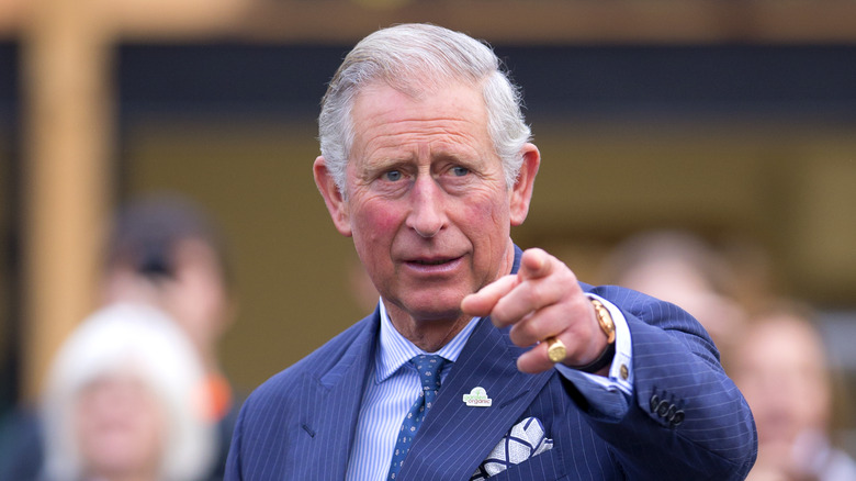 King Charles III pointing his finger