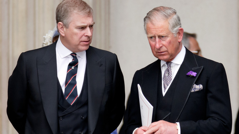 Prince Andrew speaking to King Charles III