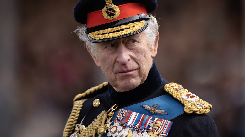 King Charles III looking sideways