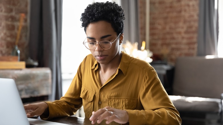 A woman working in her office.