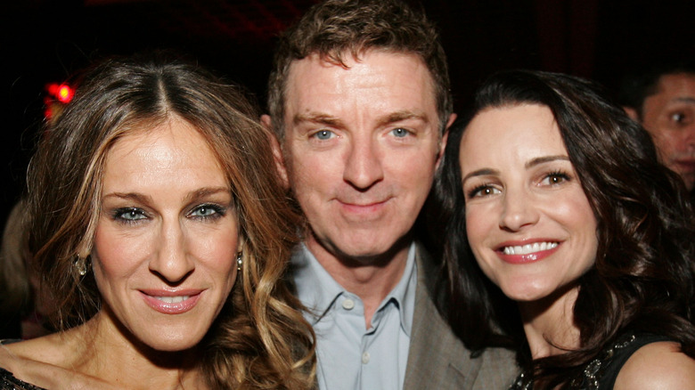 Sarah Jessica Parker, Kristin Davis, and Michael Patrick King smile