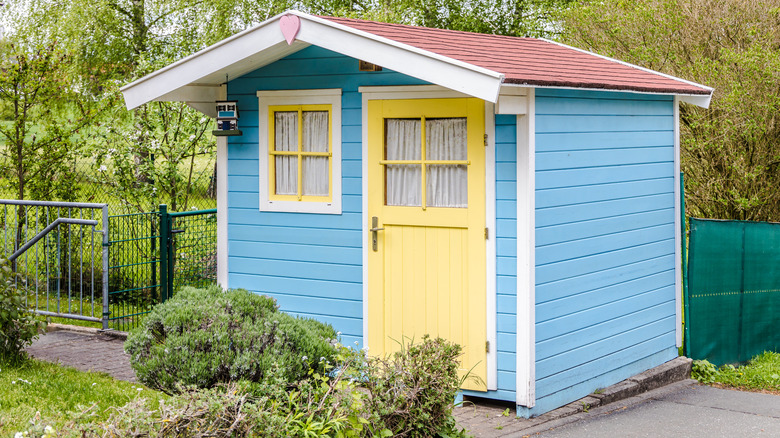 shed painted blue and yellow