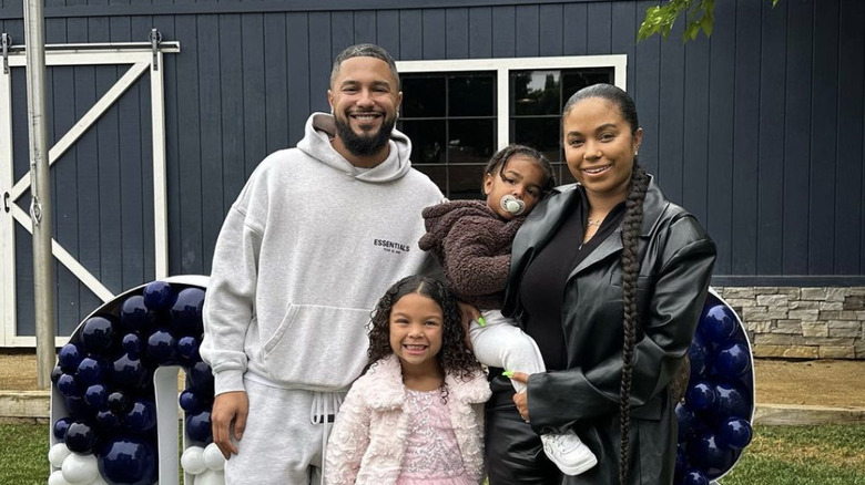 Zach Davis and Cheyenne Floyd with their children