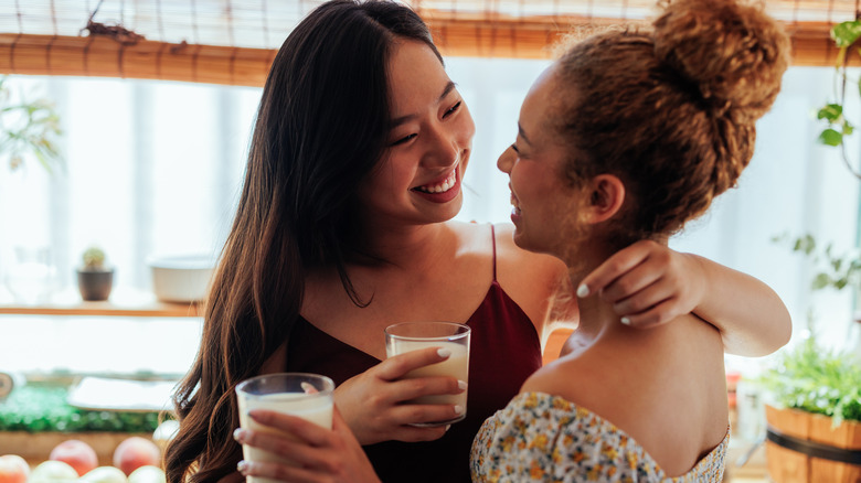 Two women looking at eachother