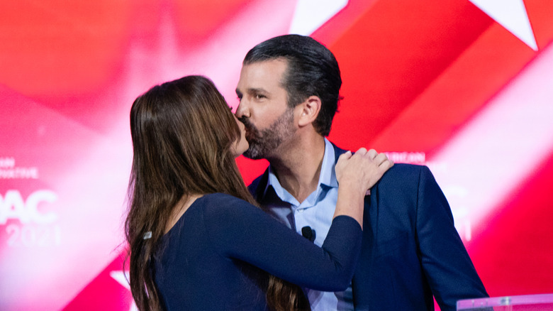 Kimberly Guilfoyle and Donald Trump Jr. kissing