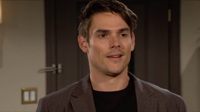 Mark Grossman performing as Adam Newman