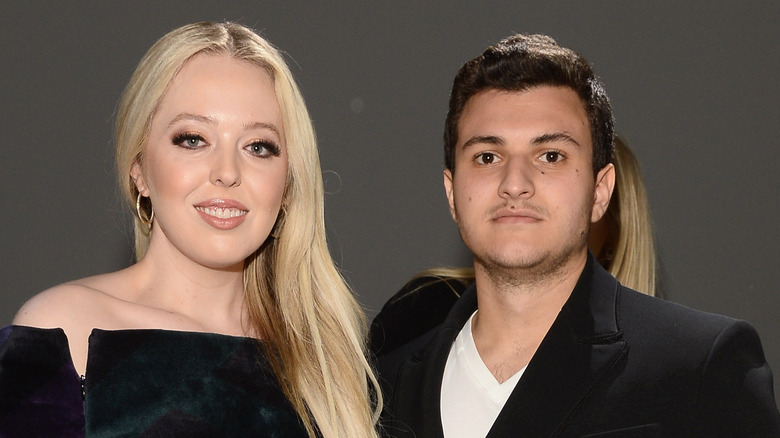 Tiffany Trump and Michel Boulos posing