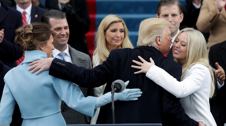 The Trump family at a podium