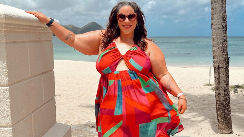 Whitney Thore smiling at beach