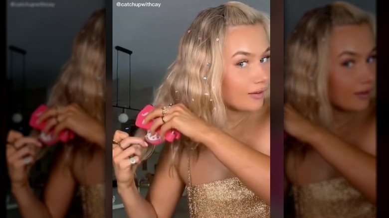 Blonde woman adds hair bling