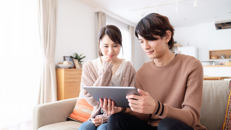 Couple watching video together