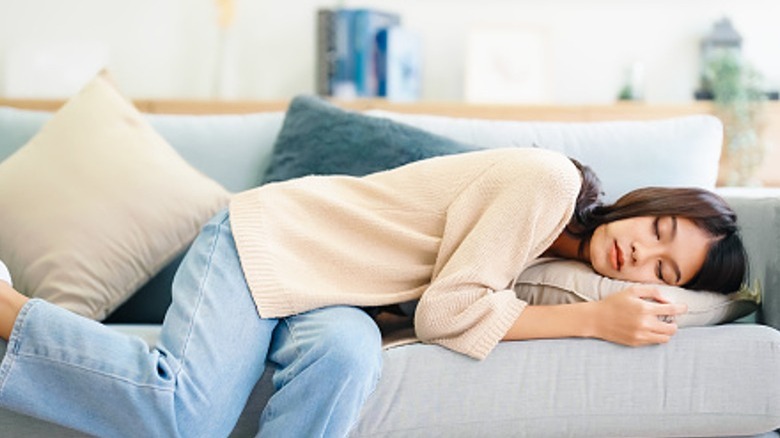 Woman resting on a couch