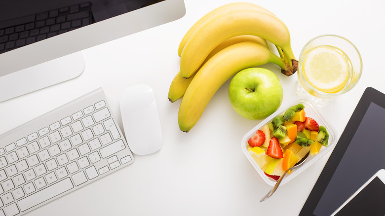 Snacks sitting on a desk.