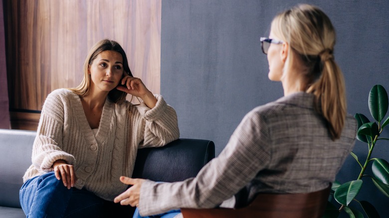 Therapist speaking to client 