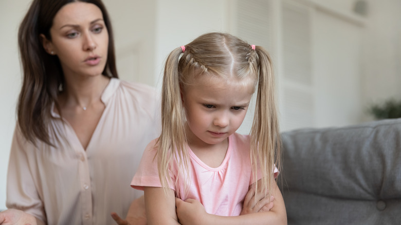 child being scolded