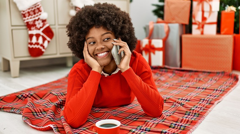 Woman on the phone at Christmastime