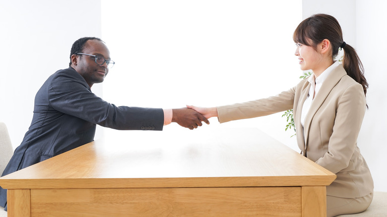 Business people shaking hands