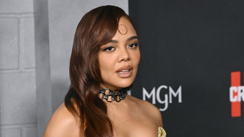 Tessa Thompson with a spiral accent