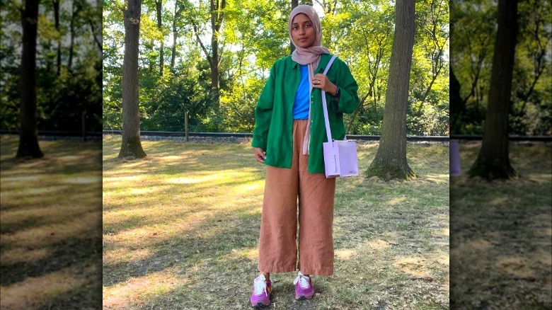 Woman in hijab and colorful outfit