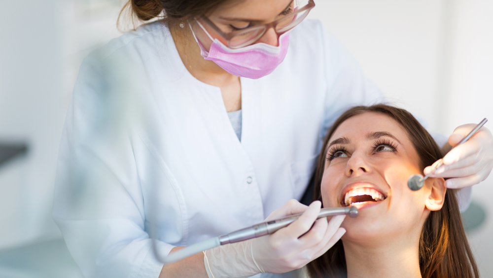 Dentist with patient