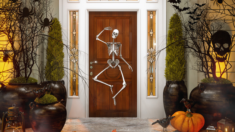 front porch filled with Halloween decorations