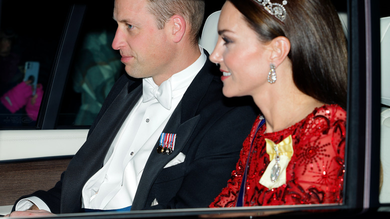 Prince William & Kate Middleton in formal attire in car