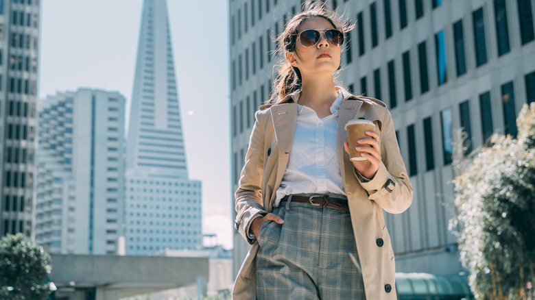 woman wearing blouse and pants