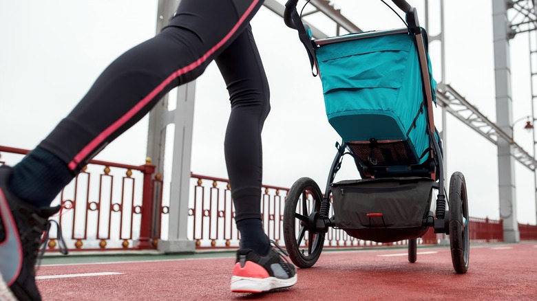 Woman running with stroller