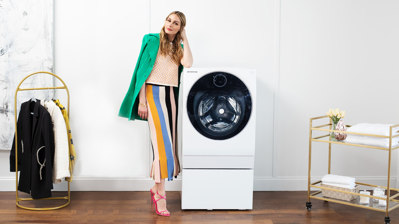 Olivia Palermo posing with LG machine