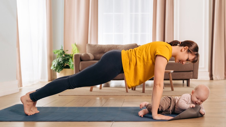 mother exercising with baby