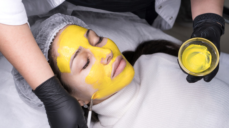 A woman getting a chemical peel