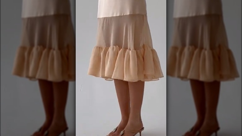 partial sheer skirt paired with heels