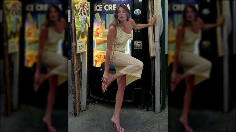 woman wearing yellow sheer skirt 