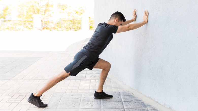 A man stretching