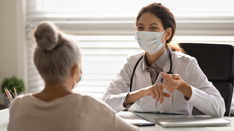 Woman talking to a doctor