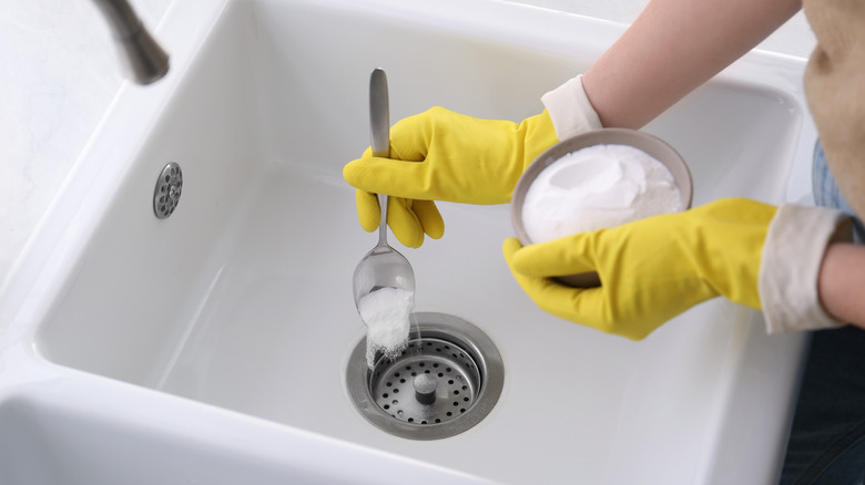 Woman cleaning with baking soda