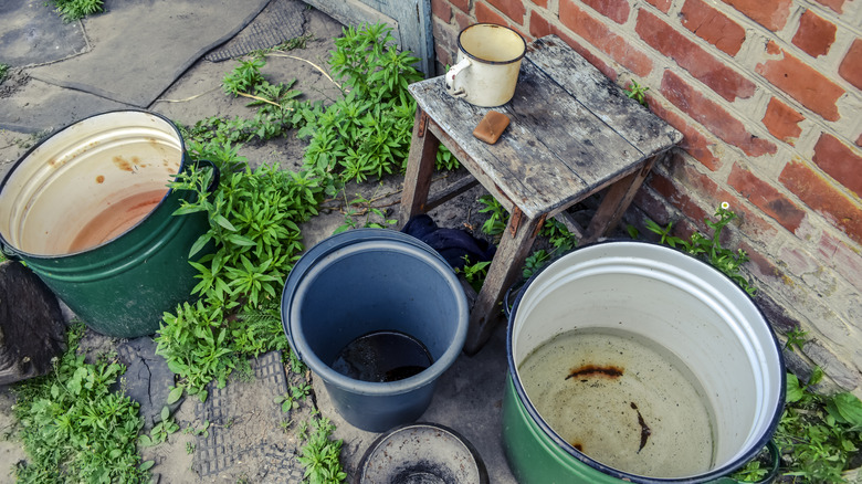 Buckets outside house