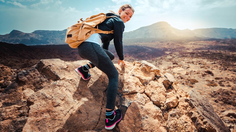 Woman rock climbing