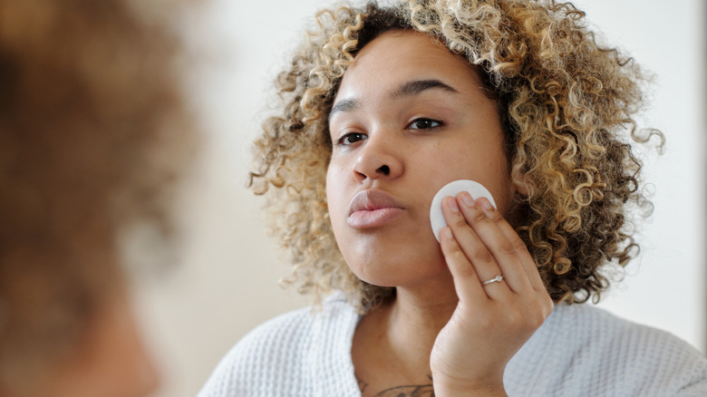 Woman practicing self-care