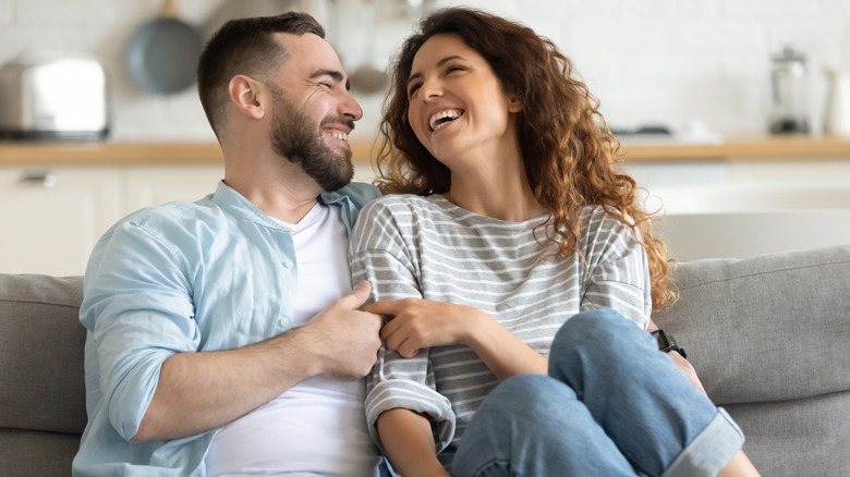 Happy couple on a couch